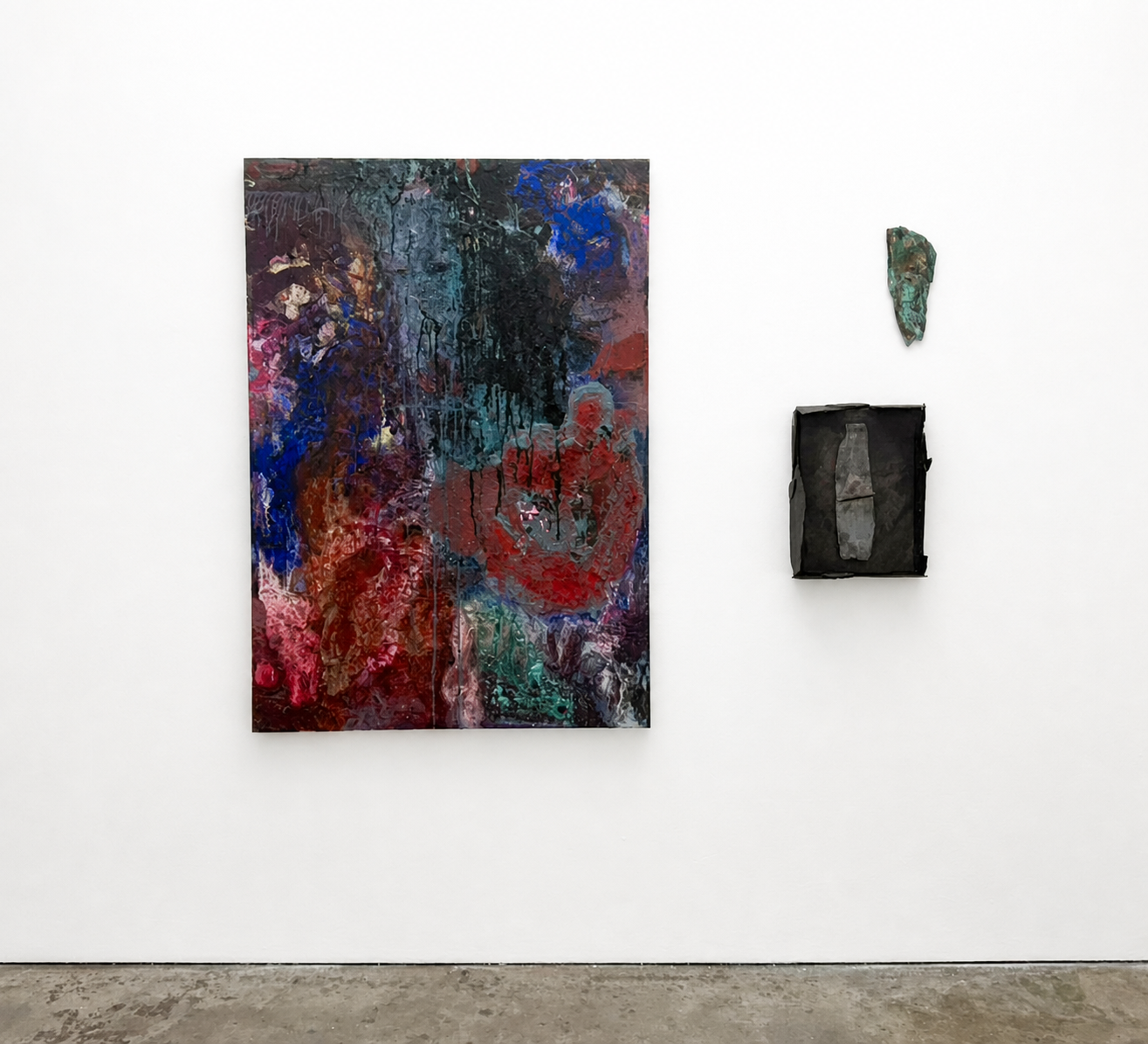 Installation view of paintings and slate works at the Royal College of Art degree show
